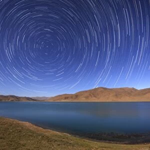 Polar star trails over Yamdrok Lake, Tibet, China