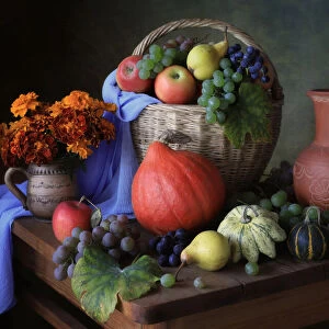 Still life with autumn fruits and flowers