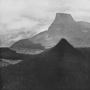 The Shadow of Adams Peak and Bible Rock. Taken from the Peak at Sunrise, c1890, (1910). Artist: Alfred William Amandus Plate