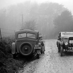 Triumph of J Cramer-Parry passing an officials Riley, MCC Exeter Trial, Blackhill, Dorset, 1930