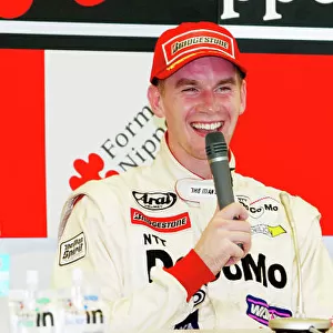 2002 Formula Nippon Championship Sugo, Japan. 4th August 2002. Richard Lyons (DoCoMo Dandelion), is interviewed after finishing in 2nd position. World Copyright: Ishihara/LAT Photographic ref: Digital Image Only