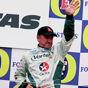 2005 Australian V8 Supercars Albert Park, Melbourne, Australia. 4th - 6th March. Russell Ingall celebrates on the podium after race 3. Portrait. World Copyright: Mark Horsburgh/LAT Photographic ref: Digital Image Only