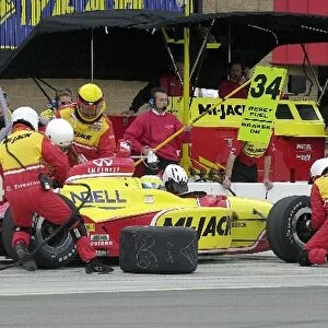 Laurent Redon, (FRA), Dallara / Infiniti, makes an early pit stop on his way to a career best third place finish in the