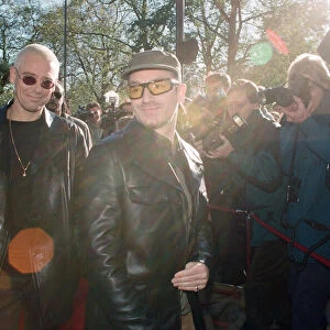 Adam Clayton and Bono of U2 arriving at The Park Lane Hotel for the Q Magazine Awards