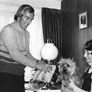 Aston Villa footballer Ray Graydon at home with his wife Sue and their pet dog cindy