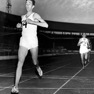 Britain v Russia Athletic Meeting: White City: London. Gordon Pirie finishes in grand
