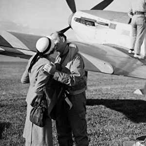 Fleet Air Arm Pilots return from Korean War - A pilot is greeted by his wife with a kiss
