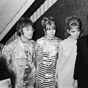 John Lennon with wife Cynthia and Ringo Starr with Maureen arriving at the film premiere