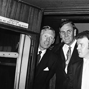 Leeds United manger Don Revie with Billy Bremner and Syd Owens at Leeds station before