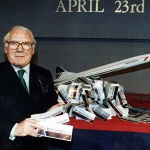 LORD KING WITH A MODEL OF CONCORDE HOLDING AIRLINE TICKETS 08 / 02 / 1995