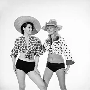 Models Barbara Ray and Jo Ann Asher seen here modeling swimming costumes
