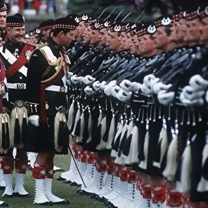 Prince Charles inspecting the ranks in full Scottish military outfit July 1988