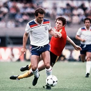 Ray Wilkins Football player playing for England in an International match running with