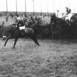 Red Rum and Brian Fletcher on their way to their first triumph in the Grand National at