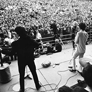 The Rolling Stones on stage at Longleat, home of Lord Bath as police
