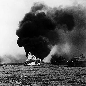 WW2 1941 Enemy tanks ablaze after their capture by South African troops