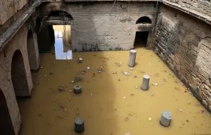Syria Prints: The 2nd century Roman amphitheatre is flooded following heavy rain in the historic