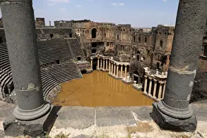 Syria Prints: The 2nd century Roman amphitheatre is flooded following heavy rain in the historic
