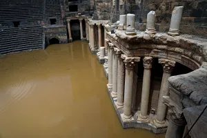 Syria Prints: The 2nd century Roman amphitheatre is flooded following heavy rain in the historic