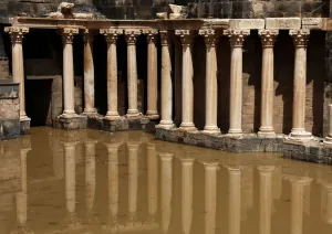 Mideast Prints: The 2nd century Roman amphitheatre is flooded following heavy rain in the historic