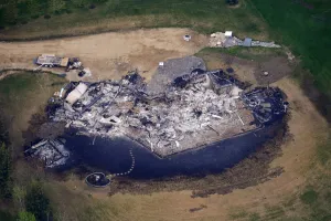 Images Dated 2011 May: An aerial view of ashes and debris of a house burned down by a wild fire in Slave Lake