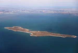 An aerial view of the Caspian Sea near the city of Baku is pictured through the window of