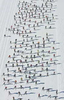 Aerial view of cross country skiers racing over the frozen Lake Sils during the Engadin