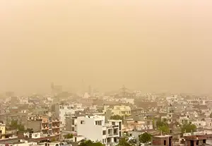 India Prints: An aerial view of the dust covered sky in Jaipur in the western state of Rajasthan