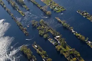 Netherlands Prints: Aerial view of houses surrounded by water near Amsterdam