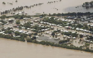 Prints of An aerial view of partially submerged houses in flooded Rockhampton in Australias state of Queensland January 2, 2011 Australia Prints: An aerial view of partially submerged houses in flooded Rockhampton in Australias state