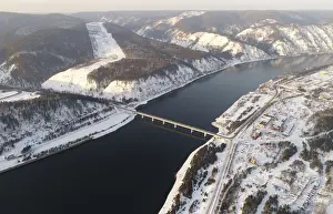 Prints of An aerial view shows a bridge of the R257 federal highway across the Yenisei River outside Krasnoyarsk, Russia February 24, 2018. REUTERS/Ilya Naymushin Russia Prints: An aerial view shows a bridge of the R257 federal highway across the Yenisei River