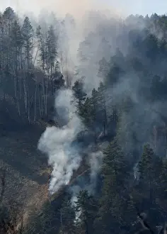 Environment Prints: An aerial view shows a forest fire in the Siberian Taiga area outside Krasnoyarsk