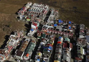 Philippines Prints: An aerial view shows houses damaged by Typhoon Haiyan, on the outskirts of Tacloban