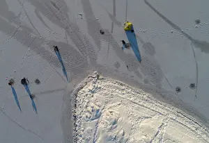 Dailylife Prints: An aerial view shows men fishing on thin ice covering the Yenisei River outside