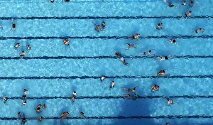 An aerial view shows people at a swimming pool on a hot summer day in Haltern