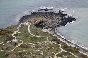 Europe Prints: An aerial view shows the Pointe du Hoc cliffs and memorial in the Normandy region