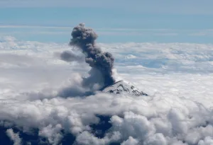 Mexico Prints: An aerial view shows the Popocatepetl volcano spewing a cloud of ash high into the air as