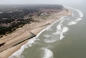 France Prints: An aerial view shows sea walls on the beach that protect sand dunes from erosion along