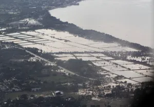 Philippines Prints: An aerial view shows villages inundated in floodwaters caused by typhoon Washi in Cagayan