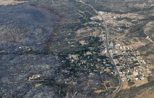 Fire Prints: An aerial view of a strip of fire retardant near Yarnell, Arizona