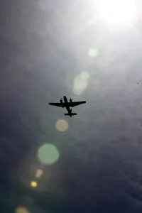 Images Dated 2012 March: An air tanker flies over a wildfire near Conifer