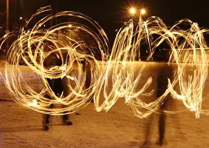 Amateur artists perform a fire show to celebrate the Chinese Lunar New Year in Russia s