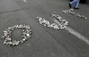 Anti-government protesters spell out their feelings towards Egypts President Hosni
