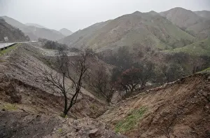 Prints of An area of La Tuna Canyon Road where a section of the hillside near the road fell near the La Tuna Fire in Los Angeles, California, March 22, 2018. REUTERS/Kyle Grillot USA Prints: An area of La Tuna Canyon Road where a section of the hillside near the road fell