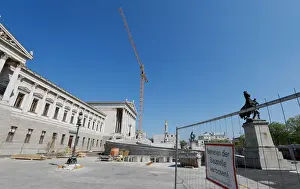 Austria Prints: The Austrian Parliament building is seen under construction in Vienna