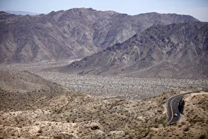 Transport Prints: Automobile travels through California desert mountains