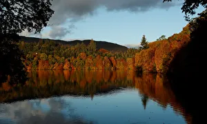 United Kingdom Prints: Autumn leaves are reflected on Loch Faskally, Pitlochry, Scotland