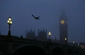 The Big Ben clock tower and the Houses of Parliament are seen in pre-dawn light