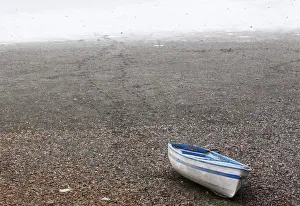A boat is seen stranded on dry land along the Danube river bank in the city of Apatin
