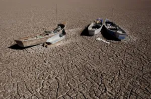 Climatechange Prints: Boats of fishermen are seen on the dried Poopo lakebed in the Oruro Department